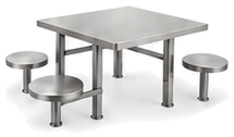 Stainless steel table with four attached round stools